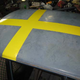 Illustration for article titled Black Metal V8olvo Now Equipped With Rebel Swedish Flag Roof
